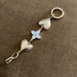 Chain strap extender.  (Used with LV Pochette strap.)